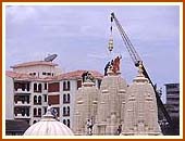 The Mandir being crowned with the Kalashas, 28 Aug 99