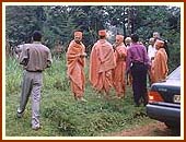 Swamishri surveying land for a new mandir 