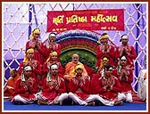 With youths who performed a colorful folk dance