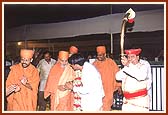 After arriving from Ahmedabad, Swamishri is greeted with a traditional welcome