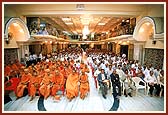 A public assembly of devotees and renowned medical professionals