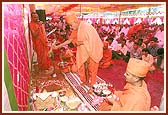 Performing the ground breaking ceremony for a new Swaminarayan Mandir