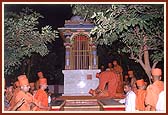 Swamishri prostrating at the shrine where Gunatitanand Swami was initiated by Lord Swaminarayan