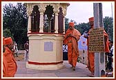 Swamishri doing pradakshina of the shrine dedicated to the place where Shreeji Maharaj had made the kitchen arrangements for a grand Yagna