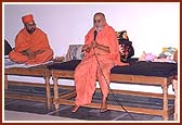  Swamishri blessing an assembly