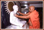 Performing abhishek on the murti of Shastriji Maharaj at the birth place