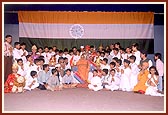 A group photo with children, teenagers and youth performers of the drama 'Sare Jahase Achha' on Children's Day program