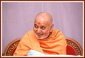 Swamishri in a joyous, merry mood.