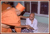 Blessing an ailing old devotee
