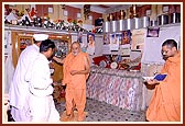 Blessing a devotee in his rural home in Himatpur