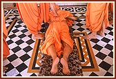 Swamishri prostrating at the Smruti Mandir, where Lord Swaminarayan was cremated, Laxmi Vadi