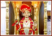 During the nine-day Shri Hari Jayanti Festival (L to R) the murtis of Ghanshyam Maharaj, Bal Ghanshyam and Ghanshyam Maharaj (in wood) were beautifully decorated each day in the mandir sanctum
