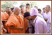 Blessing a couple of local devotees, young and old alike
