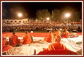 Swamishri in an evening program of kirtans