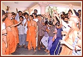 Blessing the children who had performed the rosary by standing on one leg