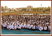 A large evening congregation of devotees