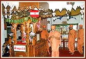 Swamishri circumambulating the  symbolic Akshar Deri in the mandir