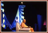 Amidst a spiritually elevating backdrop Swamishri is engrossed in saying the rosary