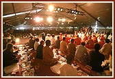 Devotees in the maha-puja ceremony