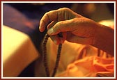 Swamishri telling the rosary that Shastriji Maharaj used for chanting in his puja