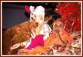 Swamishri attentively listening to the shibir program