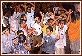 Balaks and kishores dance and rejoice in the shower of divine water. They cry for more and Swamishri blesses them with his abundant grace and joy