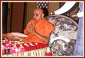 Swamishri performing his daily puja. Kishores had prepared an exquisite backdrop with Lord Swaminarayan seated on an elephant