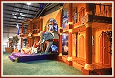 Swamishri performing his daily puja. Kishores had prepared an exquisite backdrop with Lord Swaminarayan seated on an elephant