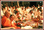 Swamishri during the maha-puja rituals in a marqee on the mandir ground