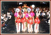 Lord Harikrishna Maharaj being honored in a Palkhi drawn by kishores and balaks