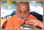 As part of the Jaljilani rituals Swamishri bathes Lord Harikrishna Maharaj in water
