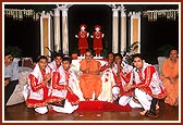 Swamishri with youths who performed a dance