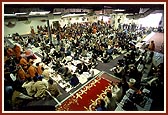 Devotees participating in the murti pratishtha mahapooja ceremony