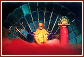Swamishri on stage watching the 2-hour cultural presentation