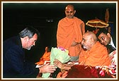 Mr. Hank Gianvecchio, Bloomindale Township Assesor, honors Swamishri with a bouquet