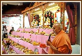 ... then blesses the assembly of devotees