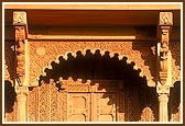 Intricate wood carvings on the Haveli facade