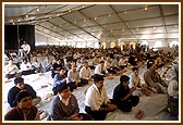 Devotees participating in the maha-puja 