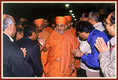 Swamishri blesses the devotees on his arrival to the London Mandir