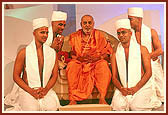 The newly initiated parshads of London with Swamishri