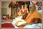 Doing mala during puja