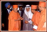 The Prime Minister respectfully sees Swamishri to the foyer of his office