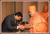 Indian Ambassador, H.E. Prabhu Dayal, greets Swamishri