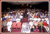 An assembly at the Indian Embassy Auditorium