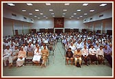 An assembly of devotees and wellwishers