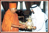 Swamishri presents a decorated Amrut Kalash