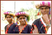 Swamishri is welcomed by the tribal devotees on his arrival to Karamkhal with a traditional tribal dance