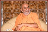 Swamishri in a divine, jovial mood during the Yogi Jayanti celebration in the mandir