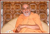 Swamishri in a divine, jovial mood during the Yogi Jayanti celebration in the mandir