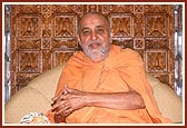 Swamishri in a divine, jovial mood during the Yogi Jayanti celebration in the mandir